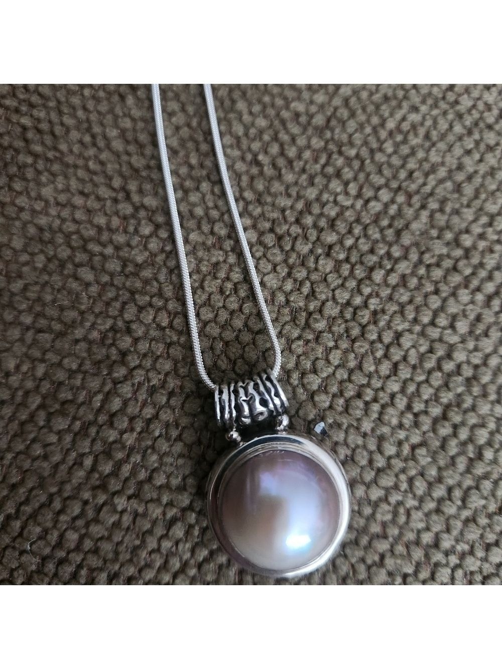 White Mabe Pearl Pendant Set in a Sterling Silver 2-Sided 3D Scroll Frame